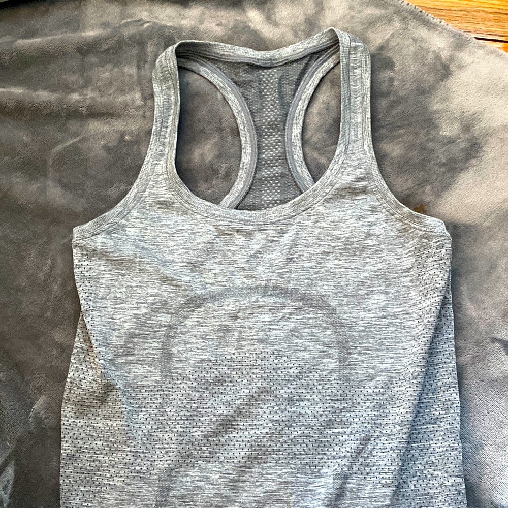 lululemon gray racer back swiftly tech tank top. size 4. never worn. NWOT.